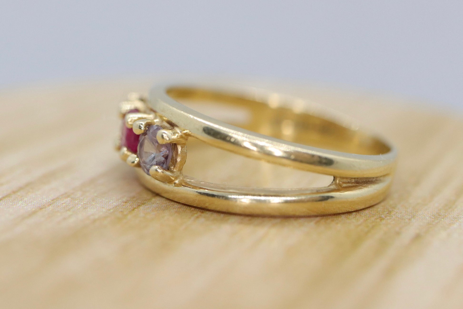 10k Yellow Gold  3 gemstone band. Ruby and Topaz band