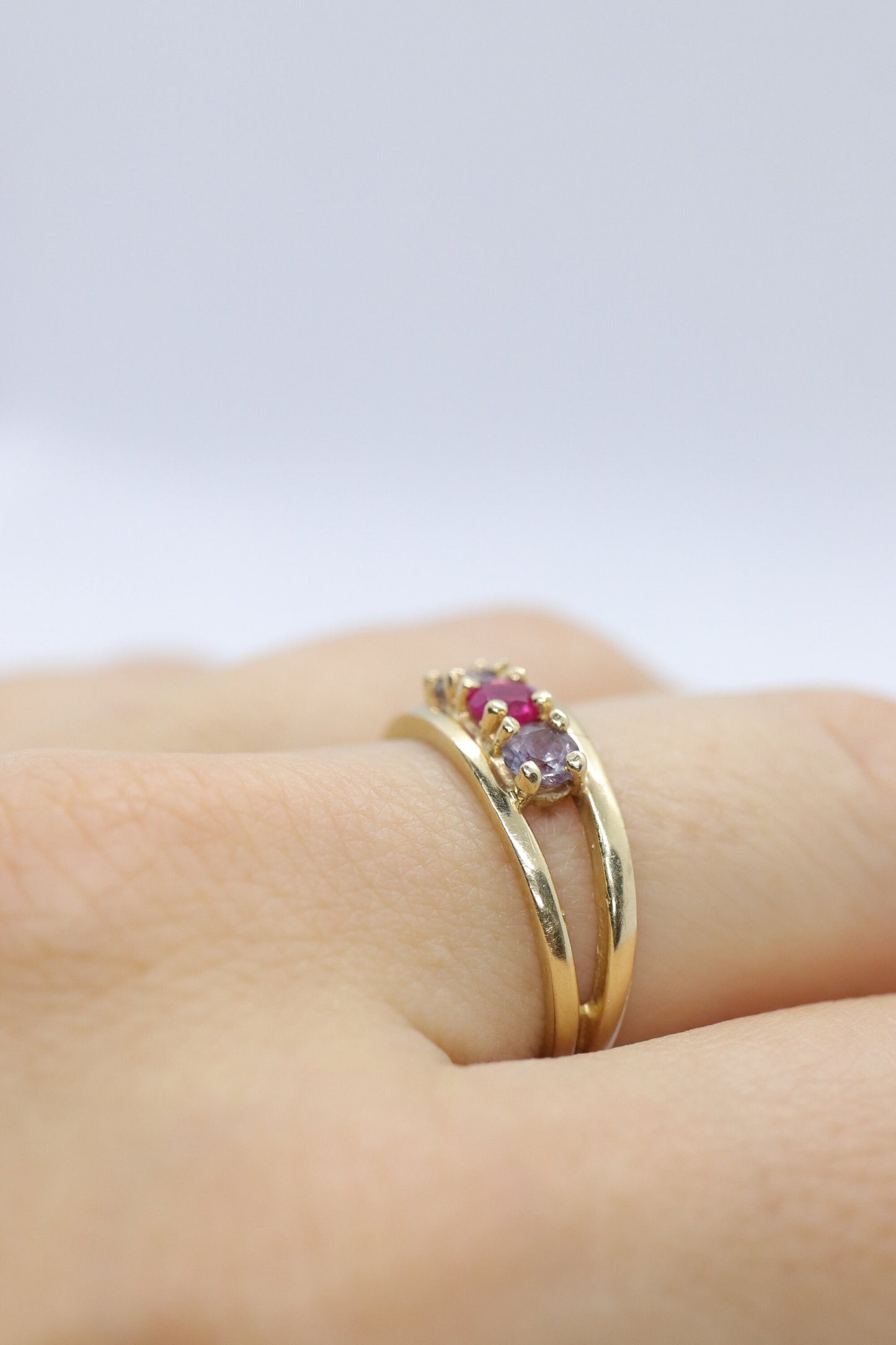 10k Yellow Gold  3 gemstone band. Ruby and Topaz band