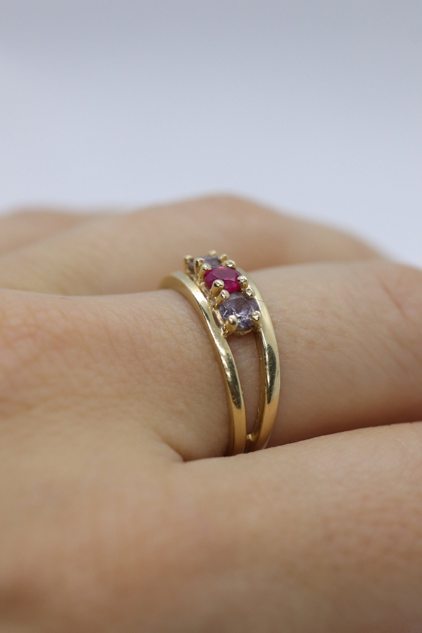 10k Yellow Gold  3 gemstone band. Ruby and Topaz band