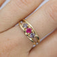 10k Yellow Gold  3 gemstone band. Ruby and Topaz band