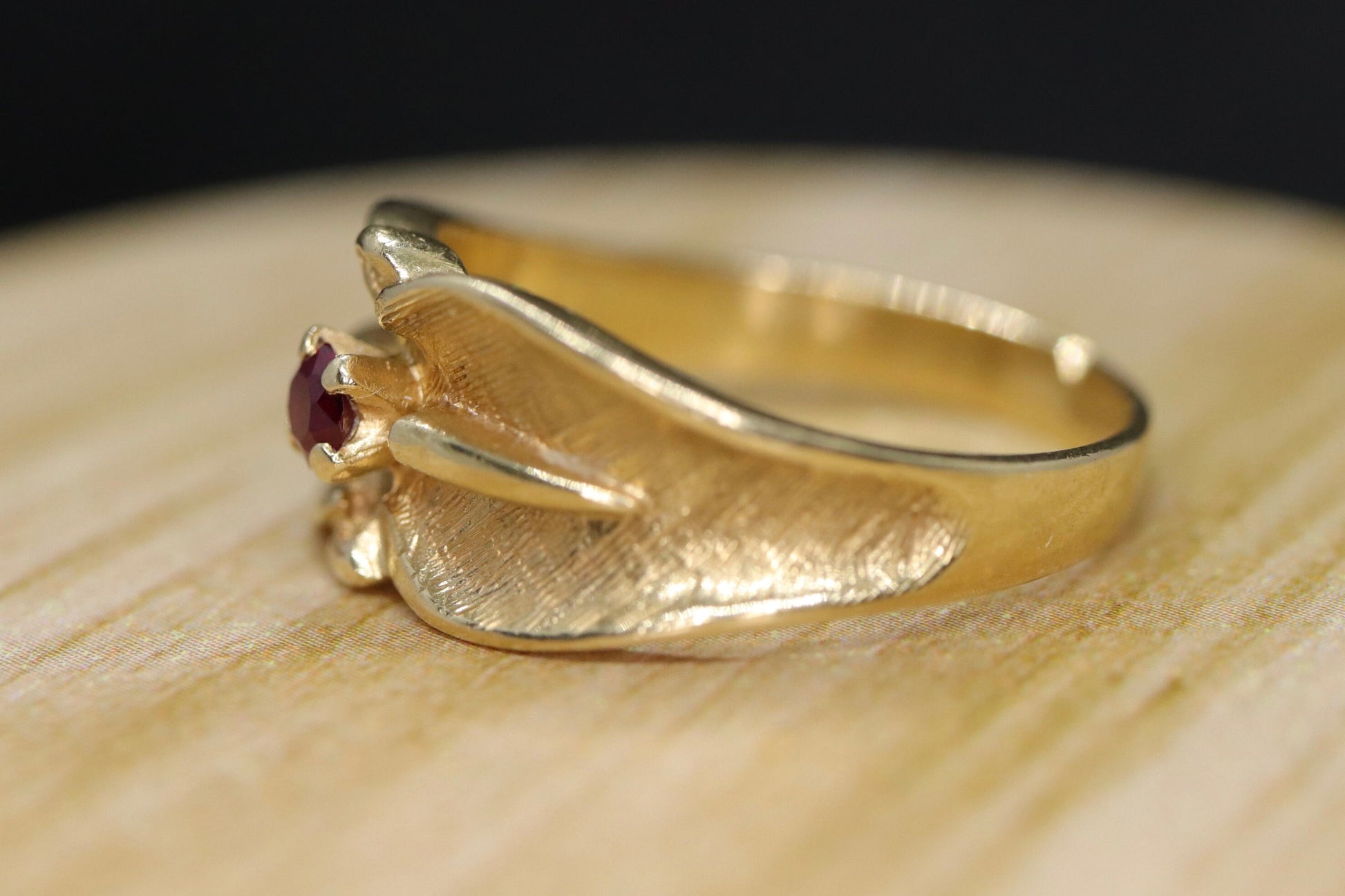 14k Ruby Ring. 14k round Ruby textured wide band