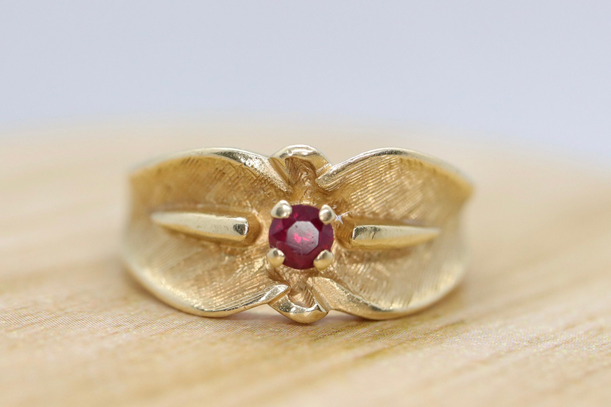 14k Ruby Ring. 14k round Ruby textured wide band