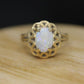 14k Opal Solitaire Claw set ring. Opal solitaire band. st(69/11)