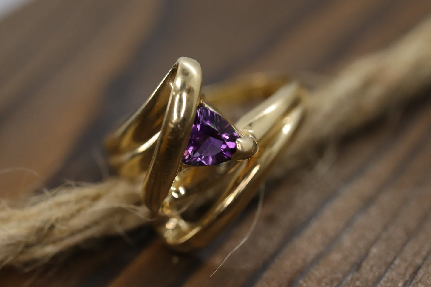 Trilliant Amethyst 10k Gold ring. 10k Triangular Amethyst in a Bypass Ring.