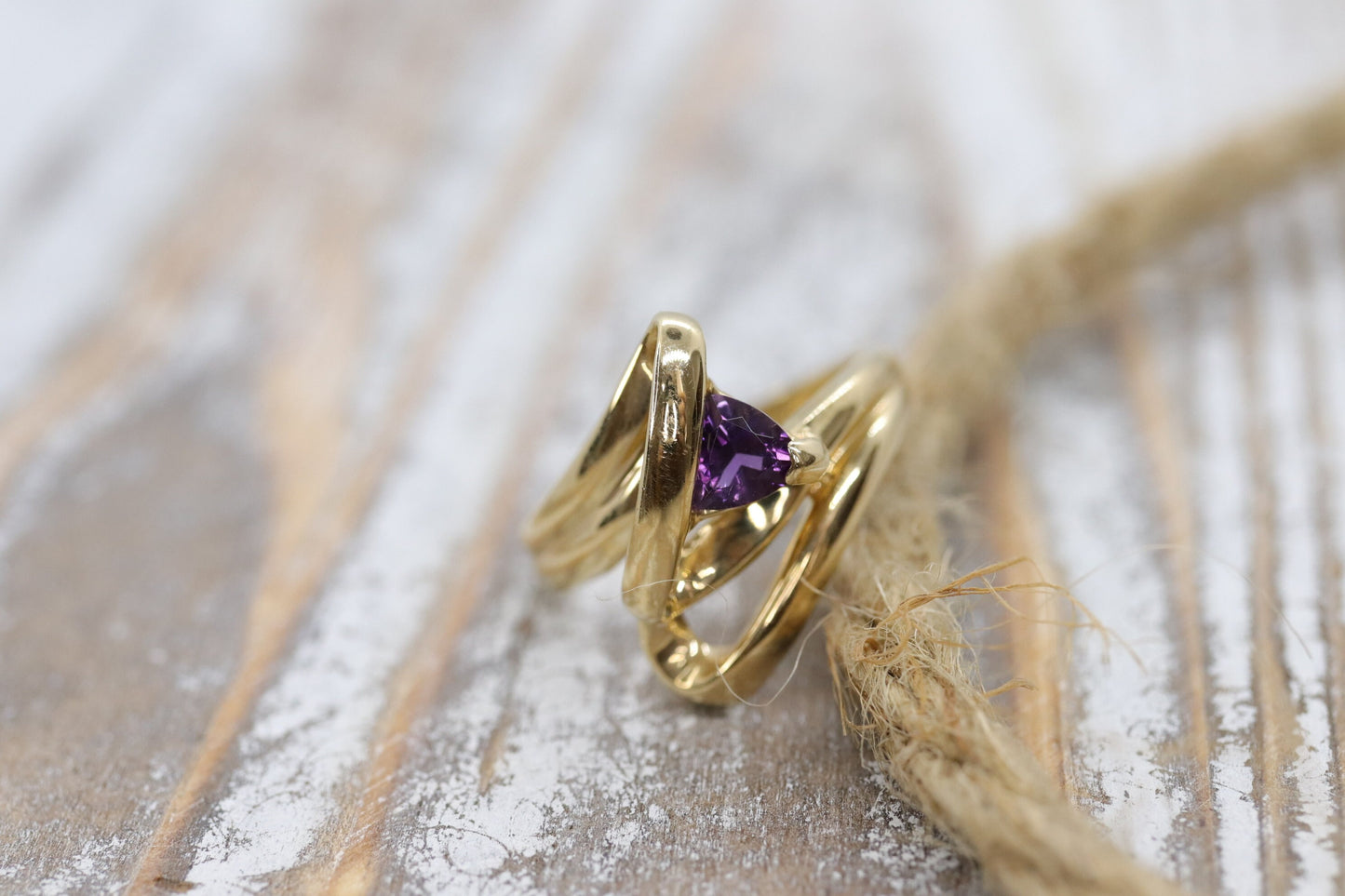 Trilliant Amethyst 10k Gold ring. 10k Triangular Amethyst in a Bypass Ring.