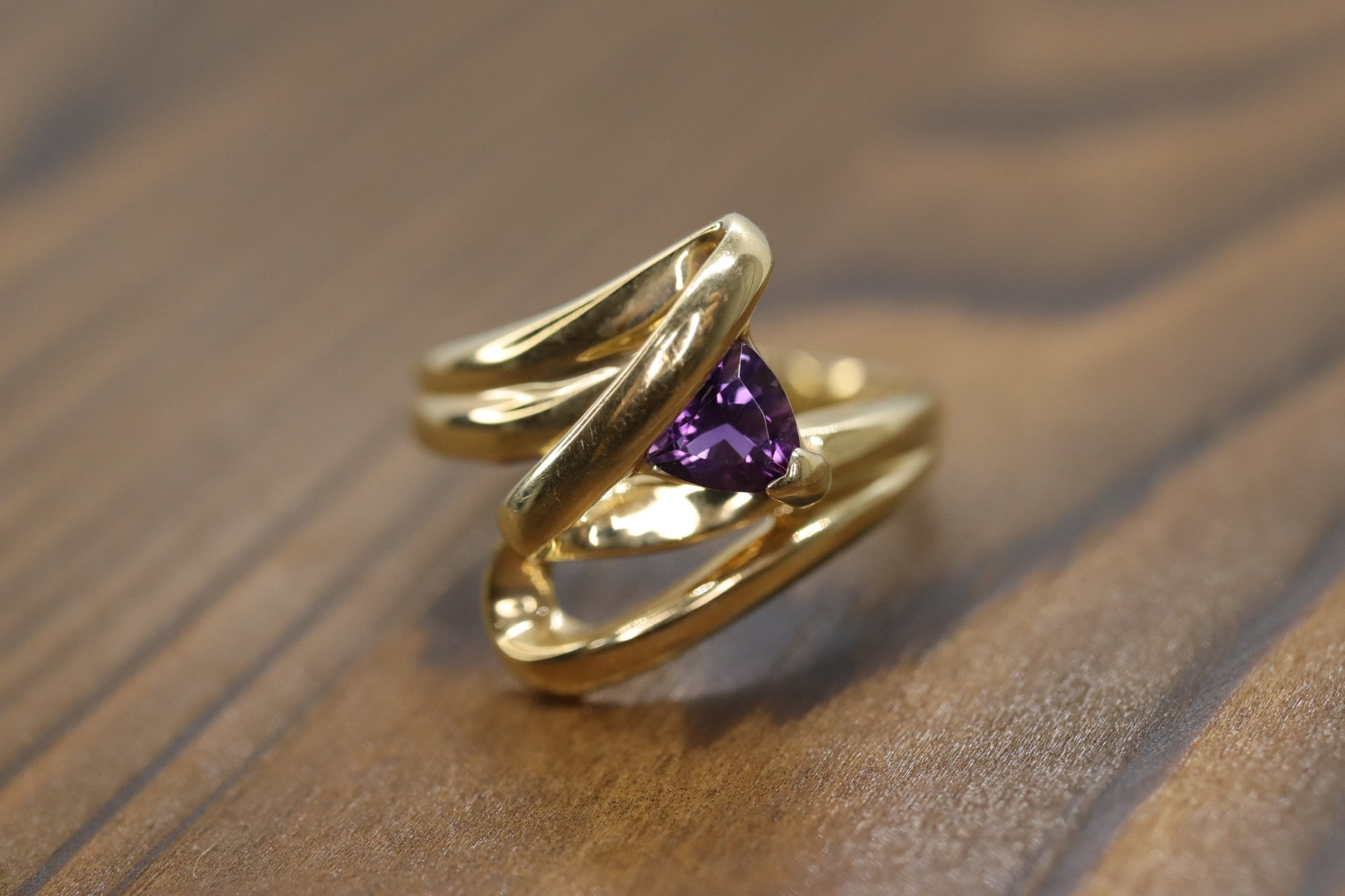 Trilliant Amethyst 10k Gold ring. 10k Triangular Amethyst in a Bypass Ring.