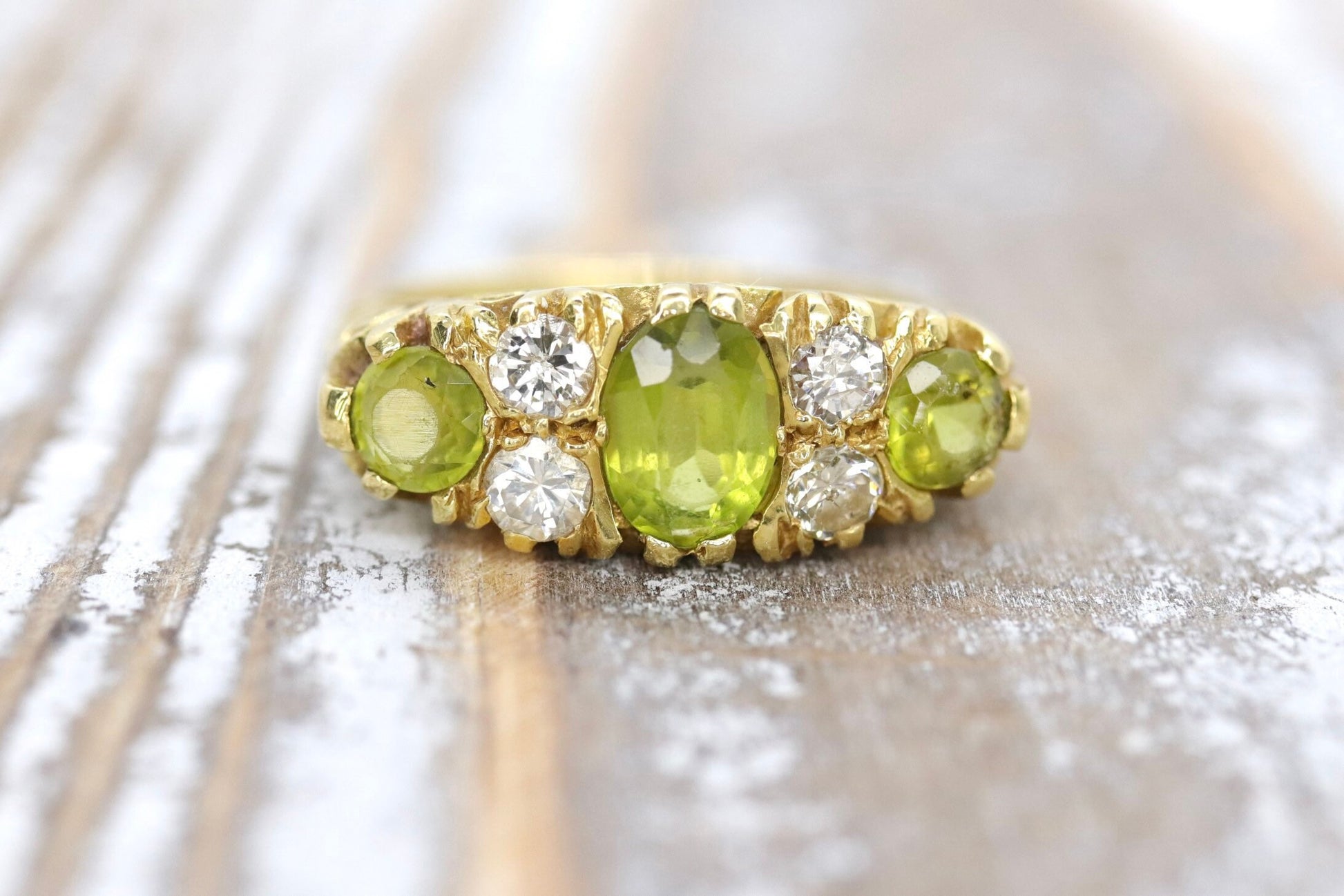 18k Large Peridot and Diamond Ring. Made in UK 1976. 6.4grams with 0.40ctw in diamonds