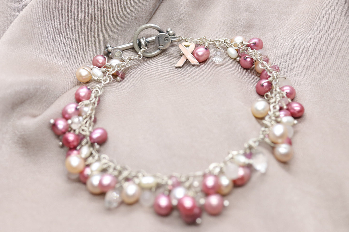 Laura Gibson Bracelet Breast Awareness. Sterling Silver with Pearls and Dangling Faceted Gems - Quartz (552)