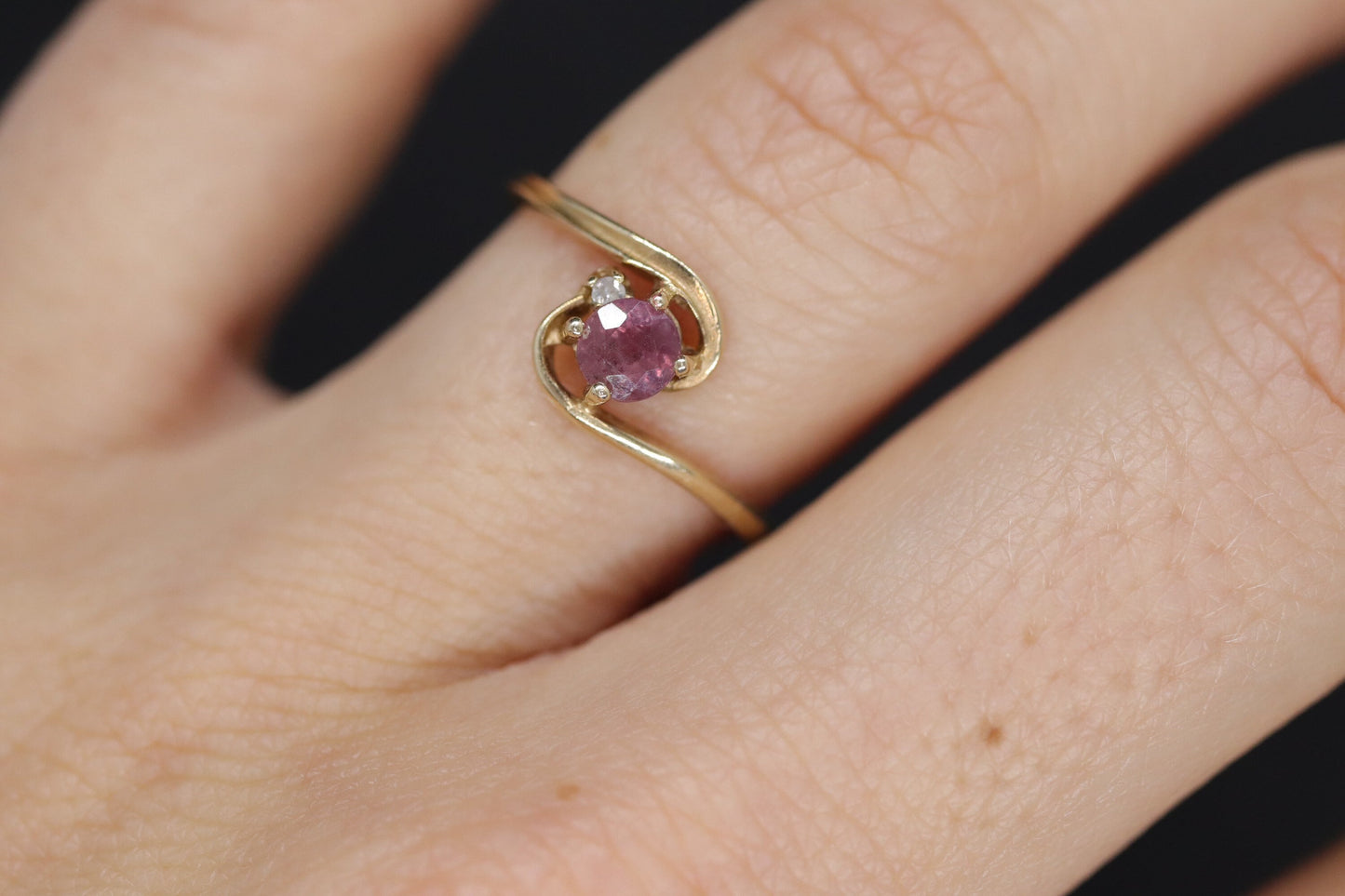 Dainty Ruby Ring. 10k round Ruby and Diamond Bypass ring