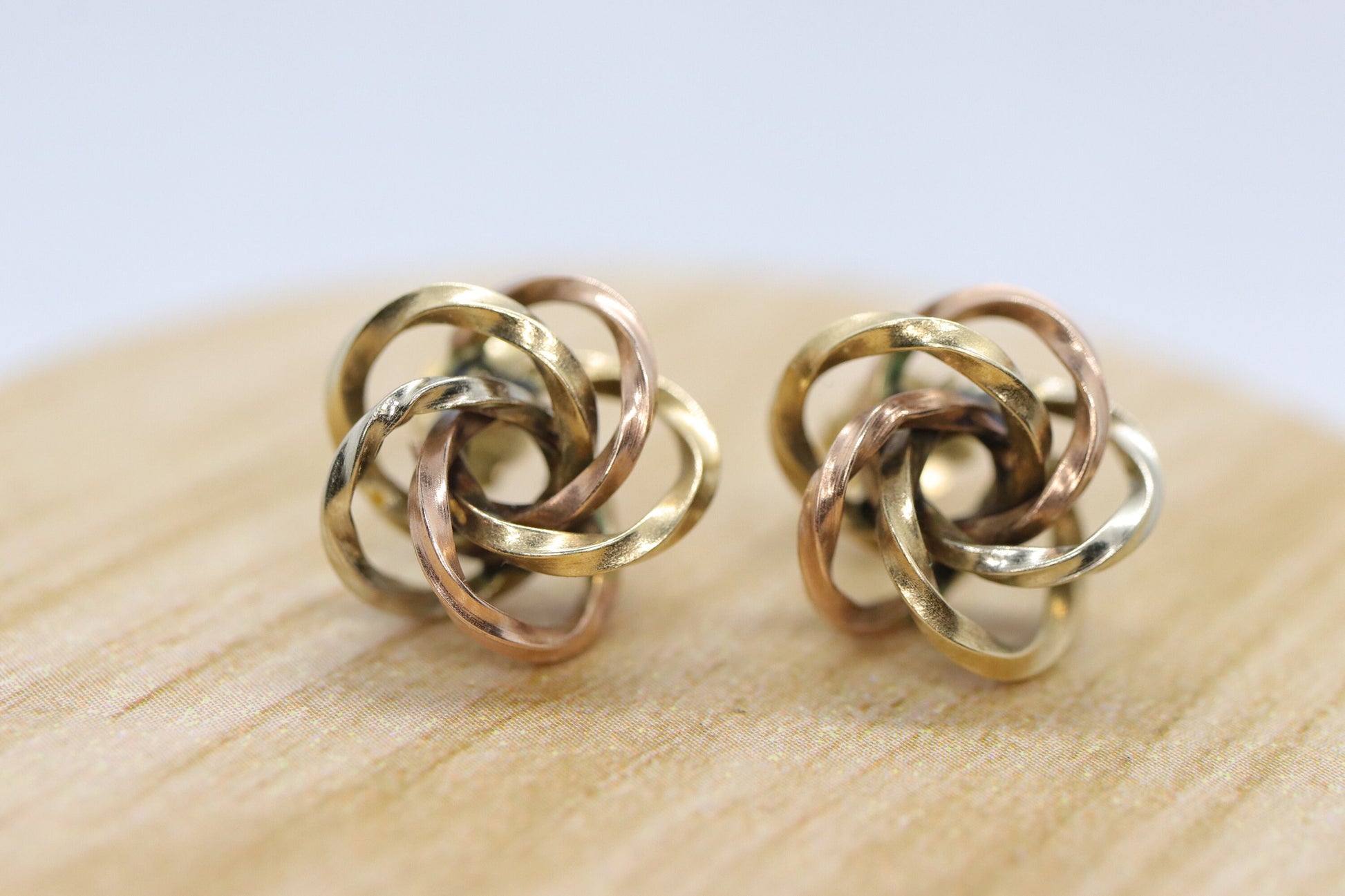 14k LOVE knot earring. Tricolor KNOT knotted gold earrings.