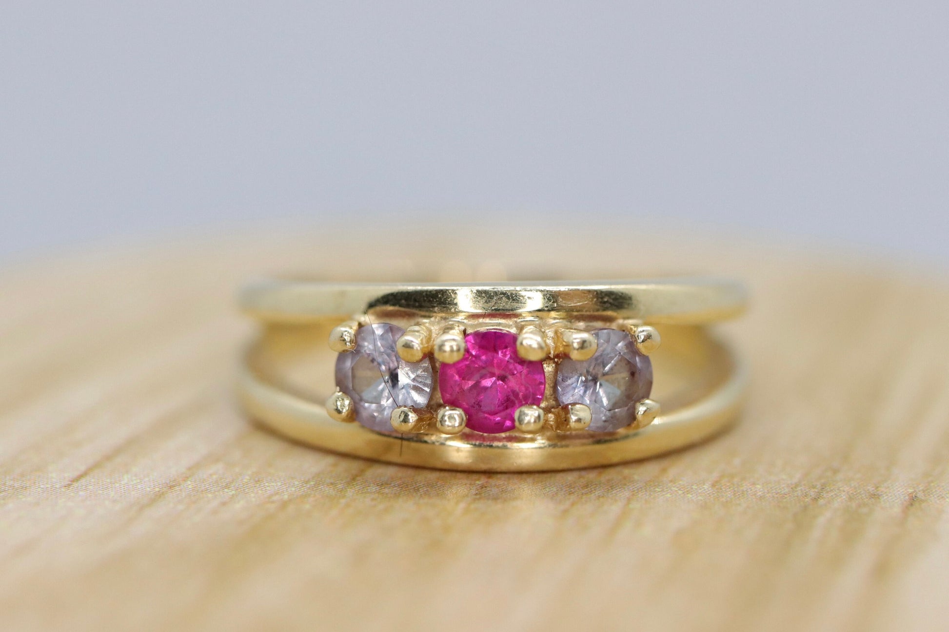 10k Yellow Gold  3 gemstone band. Ruby and Topaz band