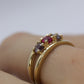 10k Yellow Gold  3 gemstone band. Ruby and Topaz band