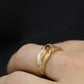 14k Ruby Ring. 14k round Ruby textured wide band