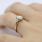 10k Opal Solitaire ring.