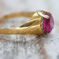 18k Round Pink Sapphire Solitaire ring. UnoAerre 18k yellow gold Sapphire ring.
