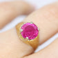 18k Round Pink Sapphire Solitaire ring. UnoAerre 18k yellow gold Sapphire ring.