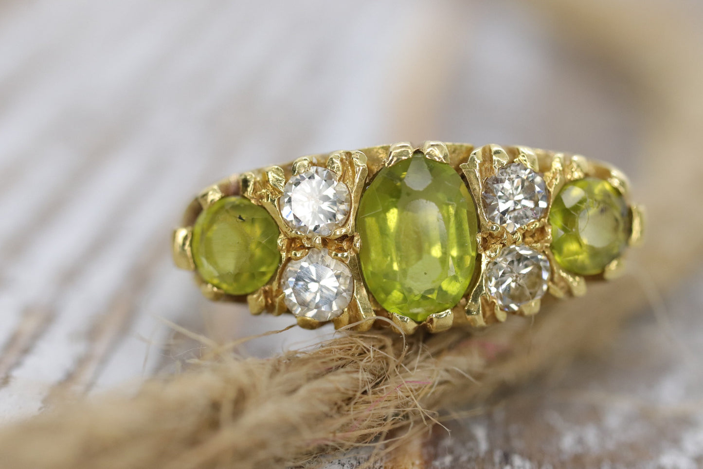 18k Large Peridot and Diamond Ring. Made in UK 1976. 6.4grams with 0.40ctw in diamonds