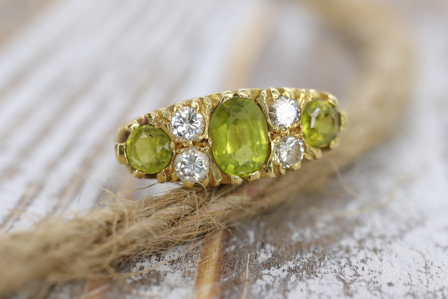 18k Large Peridot and Diamond Ring. Made in UK 1976. 6.4grams with 0.40ctw in diamonds