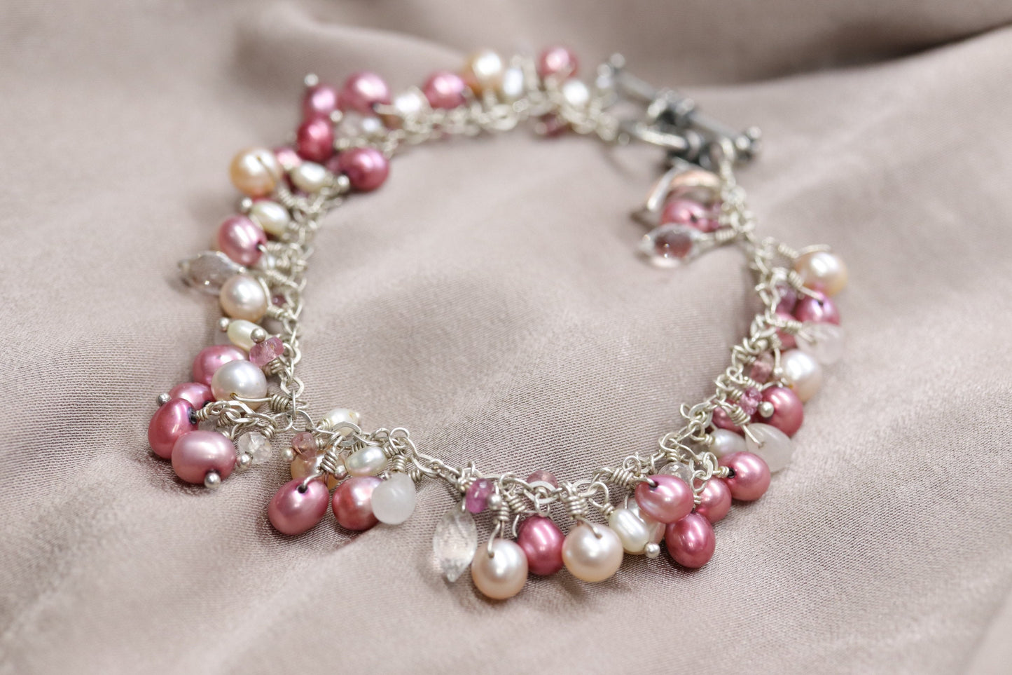 Laura Gibson Bracelet Breast Awareness. Sterling Silver with Pearls and Dangling Faceted Gems - Quartz (552)