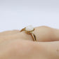 10k Opal Solitaire ring.