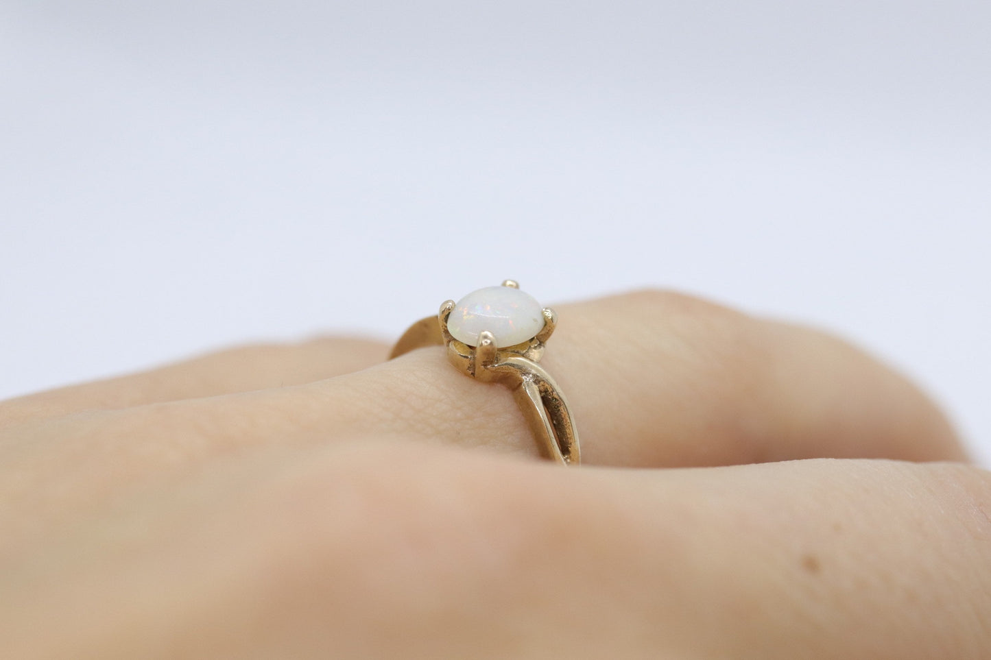 10k Opal Solitaire ring.