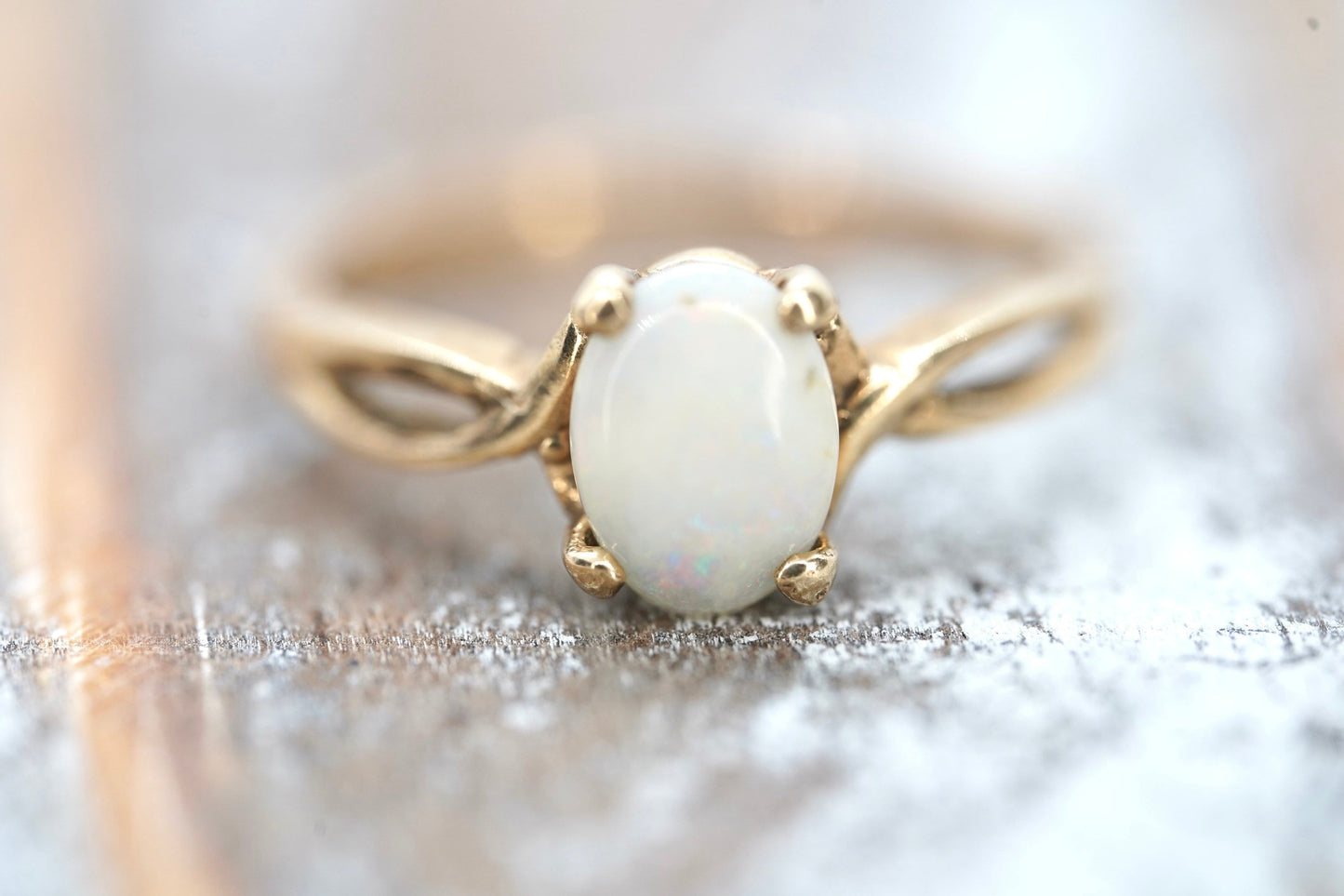 10k Opal Solitaire ring.