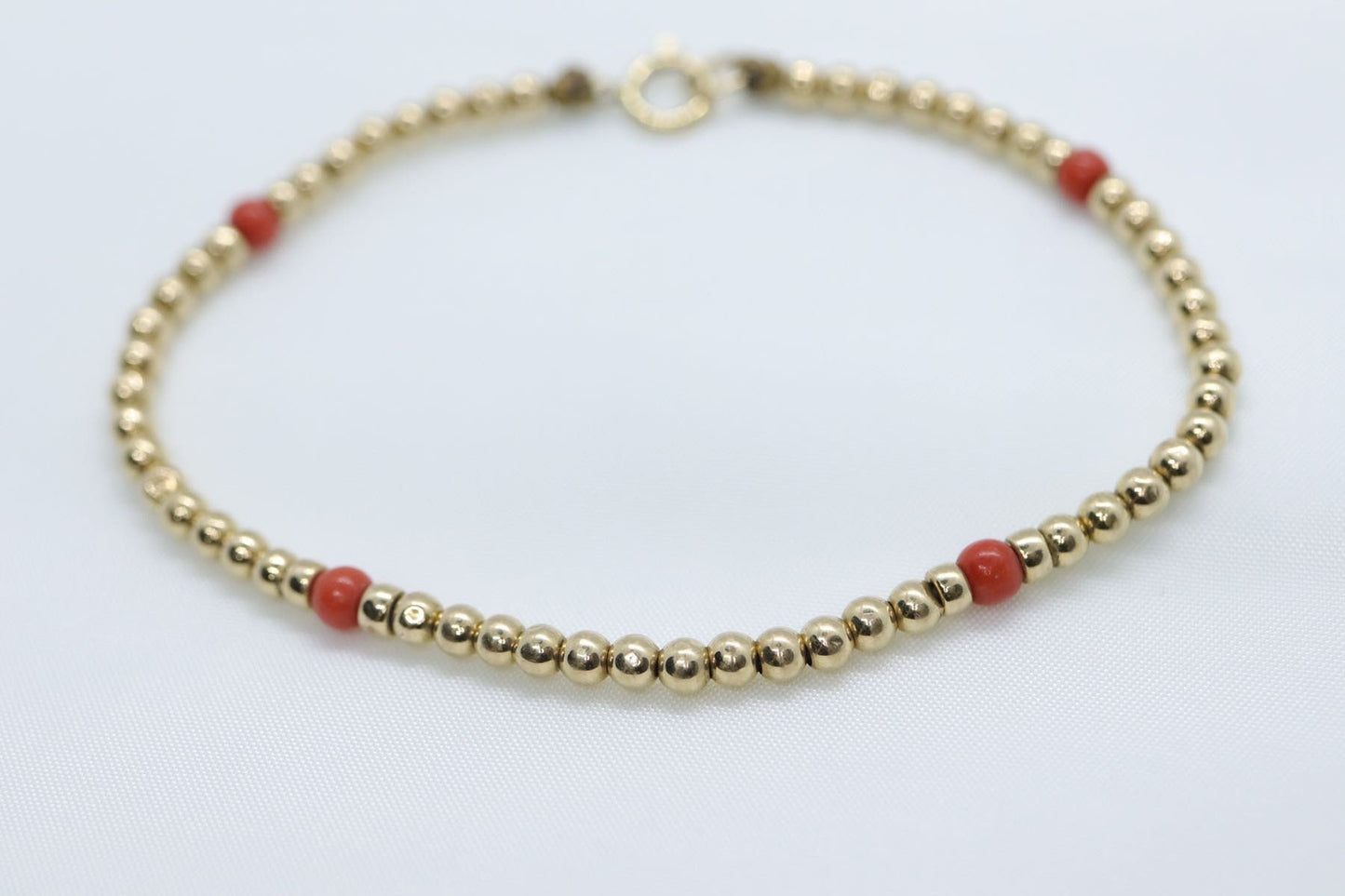 14k Gold Bead with Coral Bead Bracelet. Orange Coral bead bracelet.