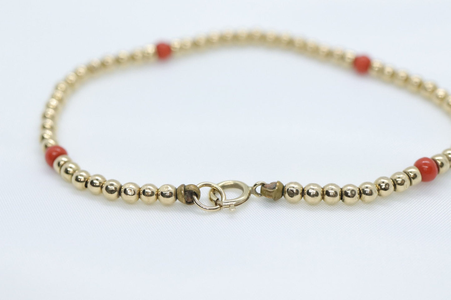 14k Gold Bead with Coral Bead Bracelet. Orange Coral bead bracelet.