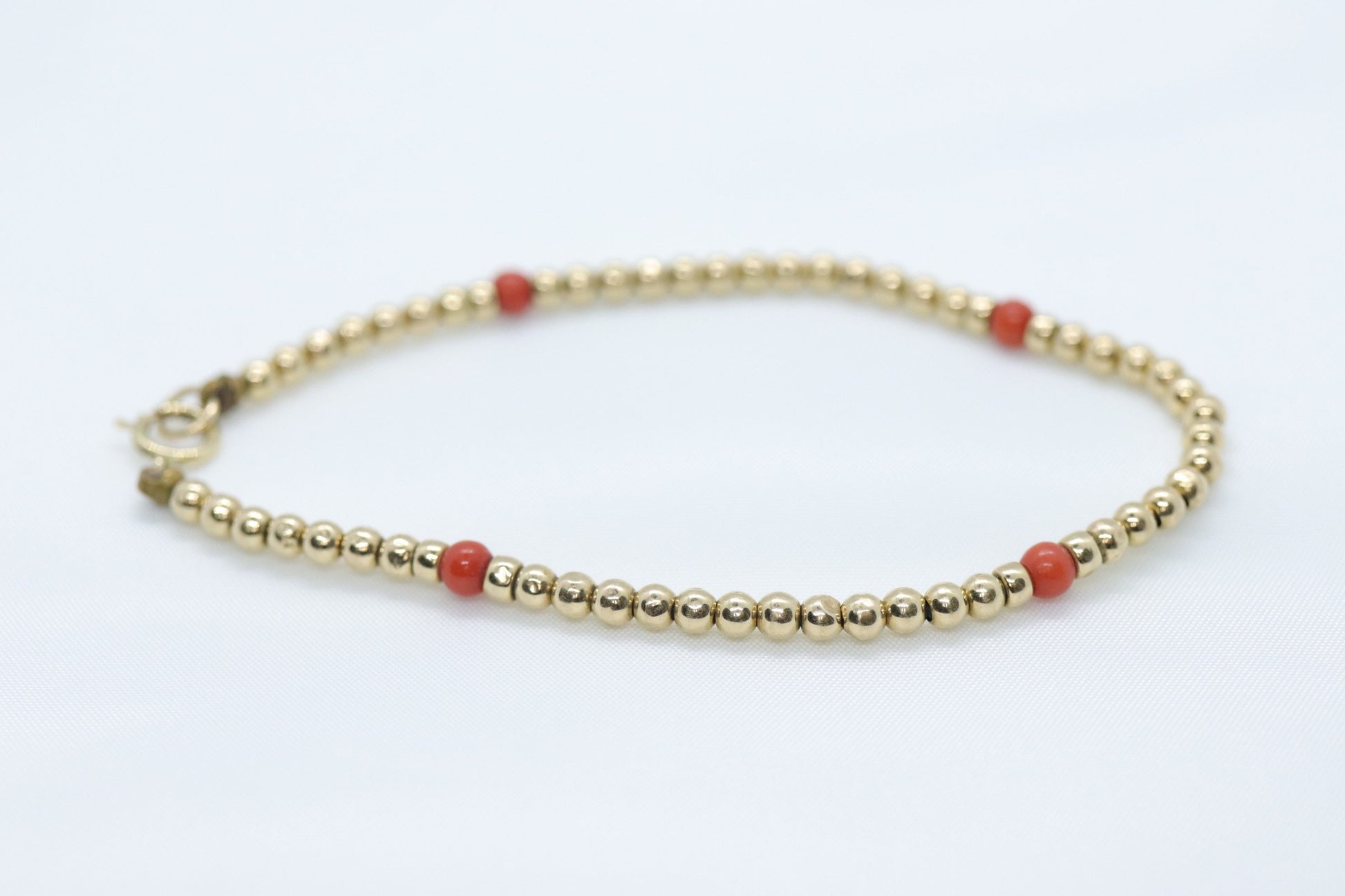 14k Gold Bead with Coral Bead Bracelet. Orange Coral bead bracelet.