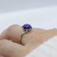 14k Blue Star Sapphire Oval Cabochon ring. Victorian Bypass Claw prong set sapphire ring.