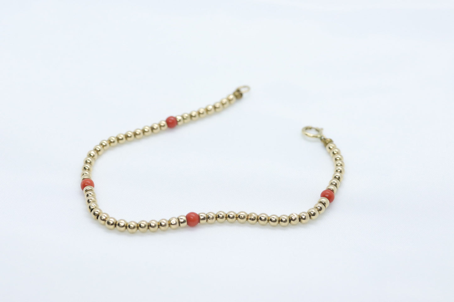 14k Gold Bead with Coral Bead Bracelet. Orange Coral bead bracelet.