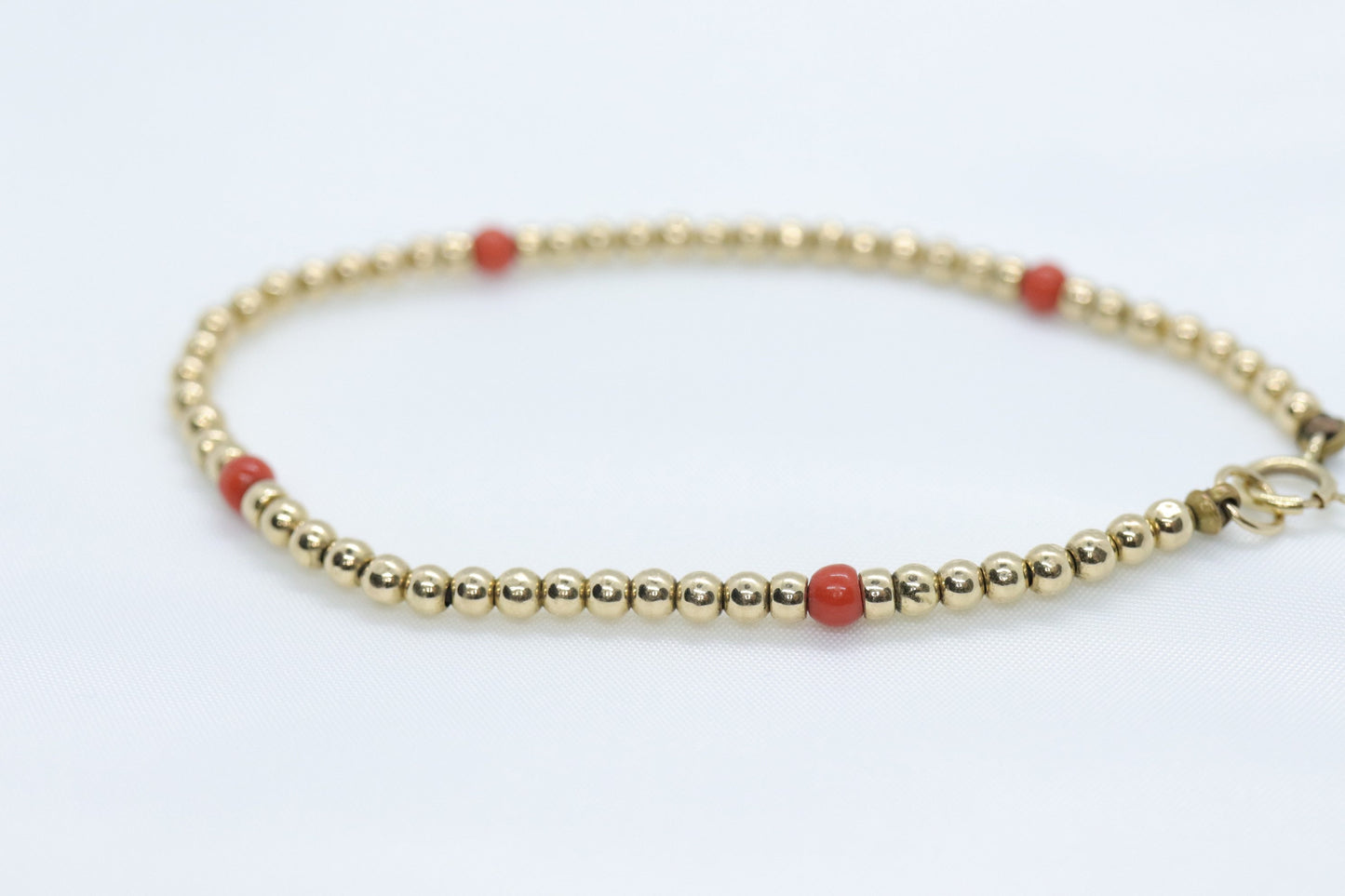 14k Gold Bead with Coral Bead Bracelet. Orange Coral bead bracelet.