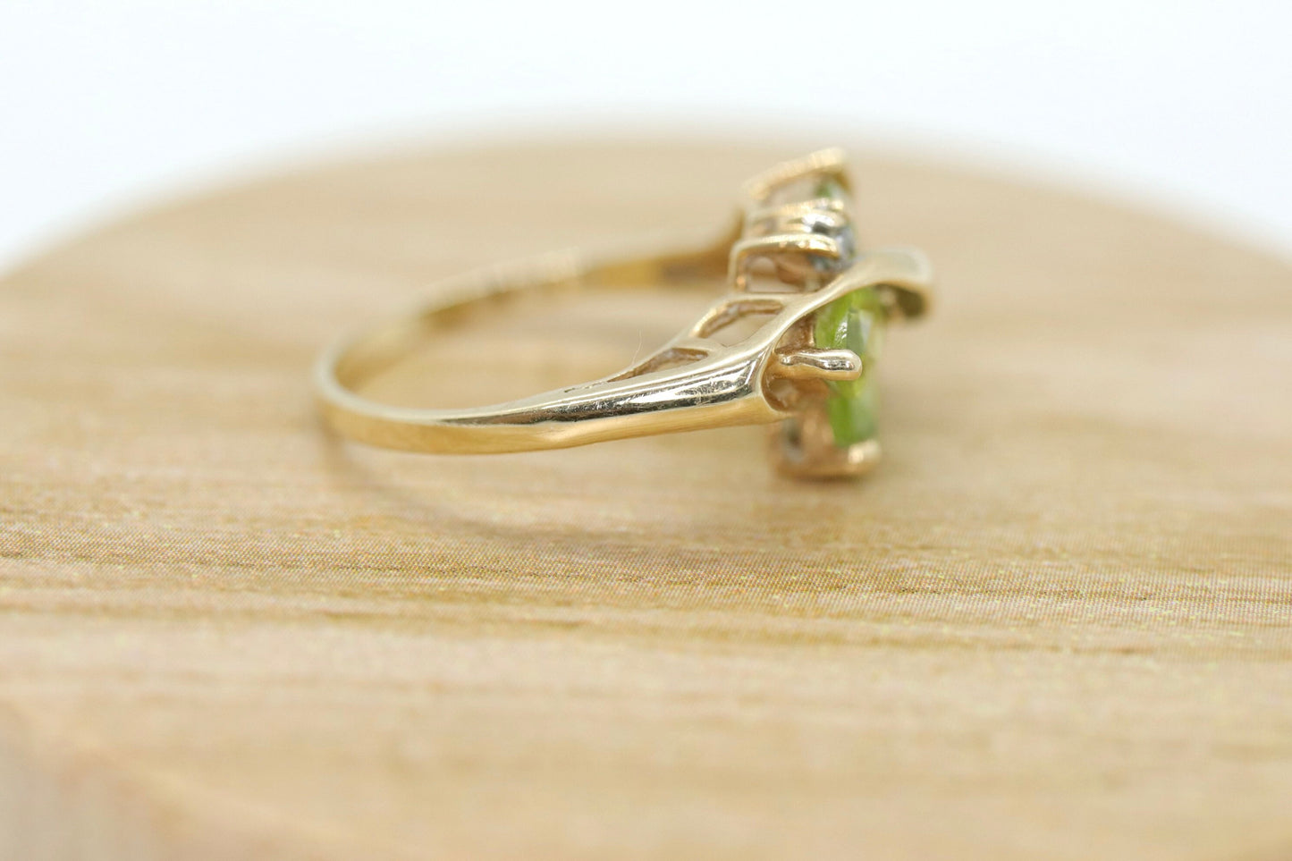 10k Peridot Marquise Leaf Motif Cluster ring. Peridot diamond ring.