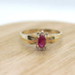 Vintage Ruby HALO Ring. 10k oval Ruby and Diamond Halo ring