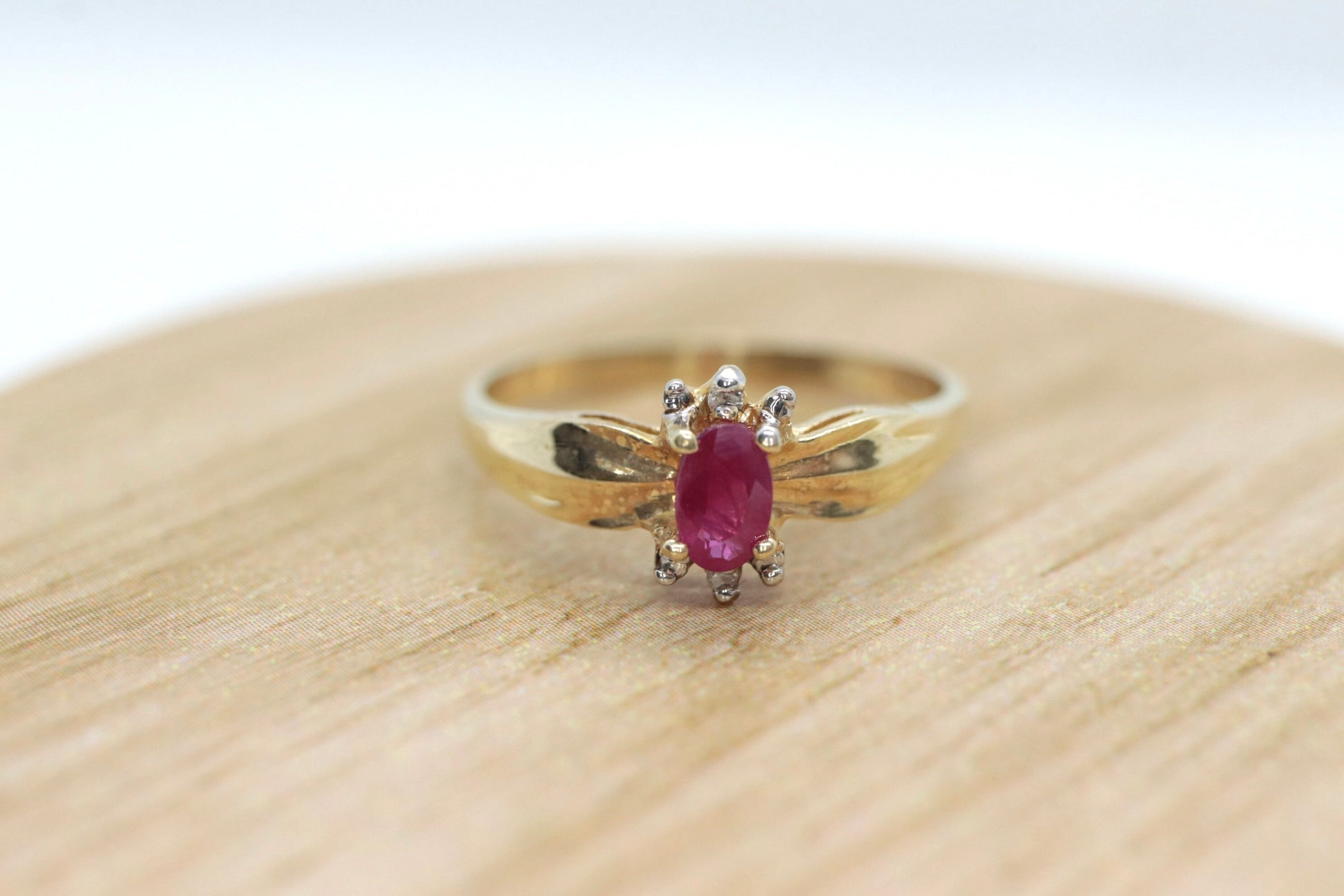 Vintage Ruby HALO Ring. 10k oval Ruby and Diamond Halo ring