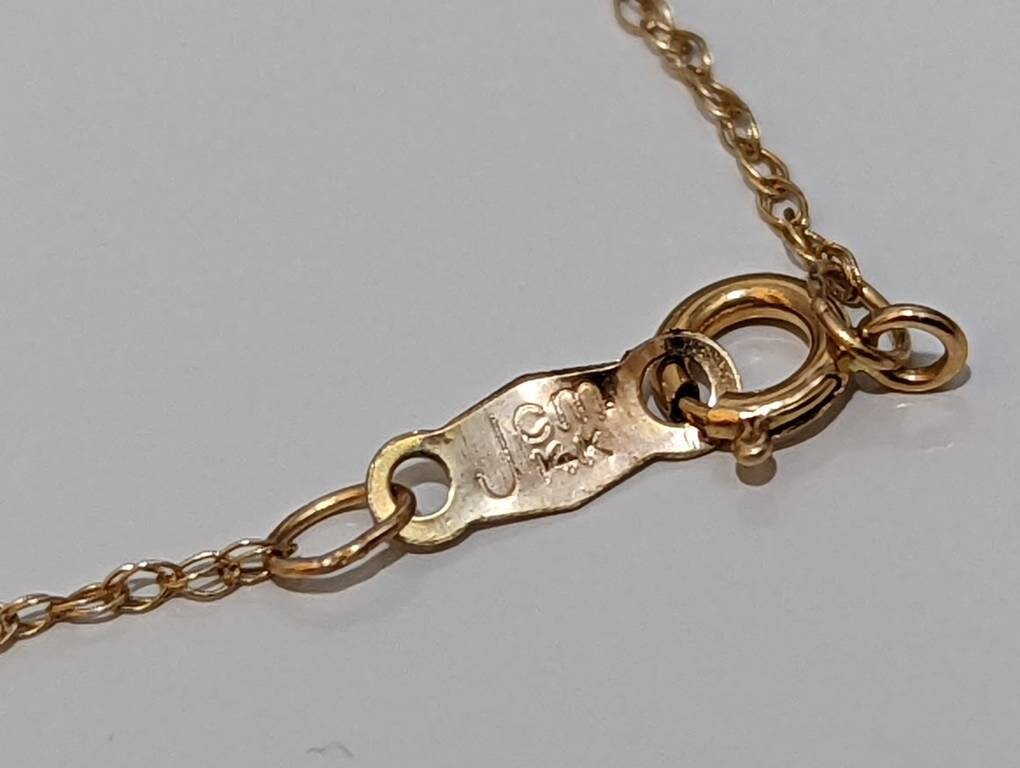 14k Open Heart Pendant. 14k Rope chain necklace. 1mm wide 18in length. Jacmel JCM