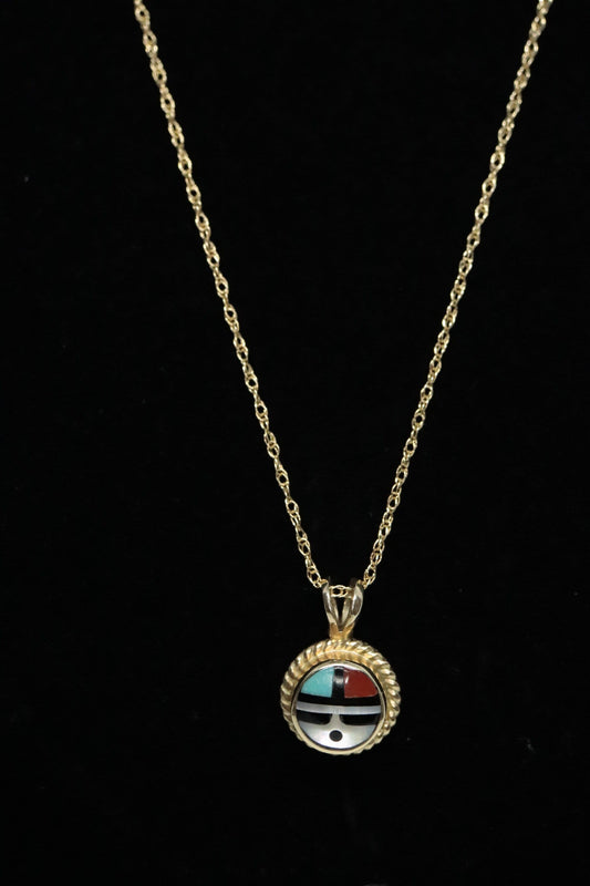 14k Zuni Pendant. Navajo Mop Turquoise Carnelian Inlay in a round canister setting. st(92/00)