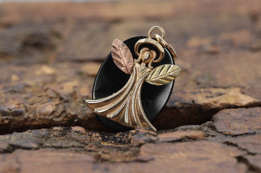 Black Hills Gold Angel Onyx Pendant. 10k multi tone Black Hills Gold Guardian Angel Pendant (58/65)