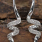 10k Diamond Earrings. Diamond Swirl Drop Dangle Earrings. 10k white gold. st(92/11)
