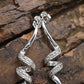 10k Diamond Earrings. Diamond Swirl Drop Dangle Earrings. 10k white gold. st(92/11)