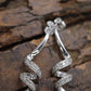 10k Diamond Earrings. Diamond Swirl Drop Dangle Earrings. 10k white gold. st(92/11)