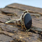 Oval Onyx ring. 10k ornate gold frame onyx ring. Mourning ring. St(103/50)