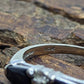 10k Onyx and White topaz Band. 10k Double Onyx and topaz ring. st(93/15)