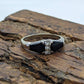10k Onyx and White topaz Band. 10k Double Onyx and topaz ring. st(93/15)