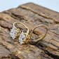14k Princess diamond CZ dangle earrings. st(88/11)