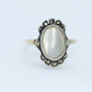 Victorian MOP Set ring. Antique 8k Gold and Sterling Silver with Mother of Pearl and Marcasite Halo ring. st(93)