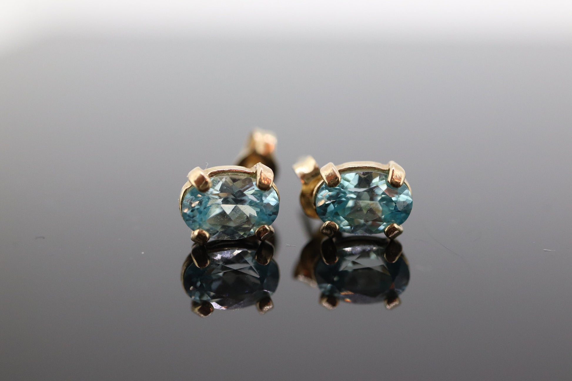 10k Blue Topaz STUD earrings. 10k Dainty oval Topaz stud earrings. st(45)