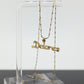 14k DELORES name pendant. DELORES 14k yellow gold pendant and necklace. st(81)