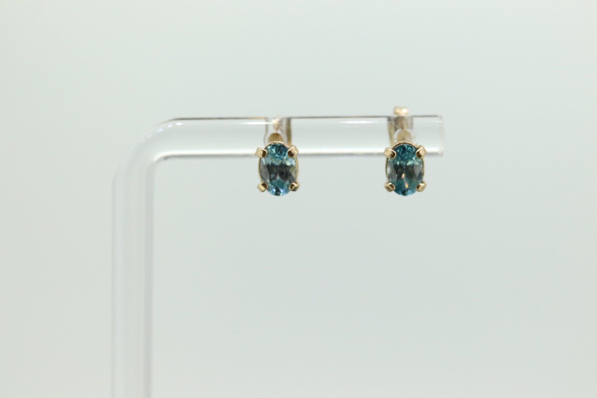 10k Blue Topaz STUD earrings. 10k Dainty oval Topaz stud earrings. st(45)