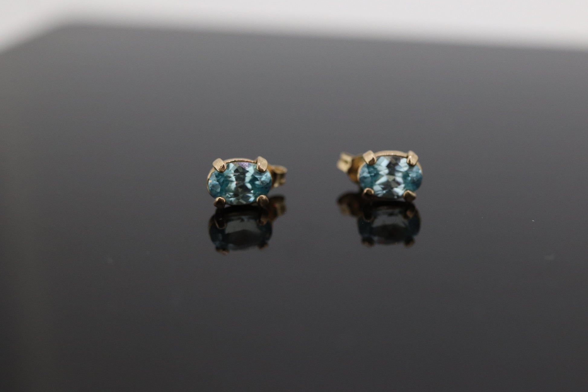 10k Blue Topaz STUD earrings. 10k Dainty oval Topaz stud earrings. st(45)